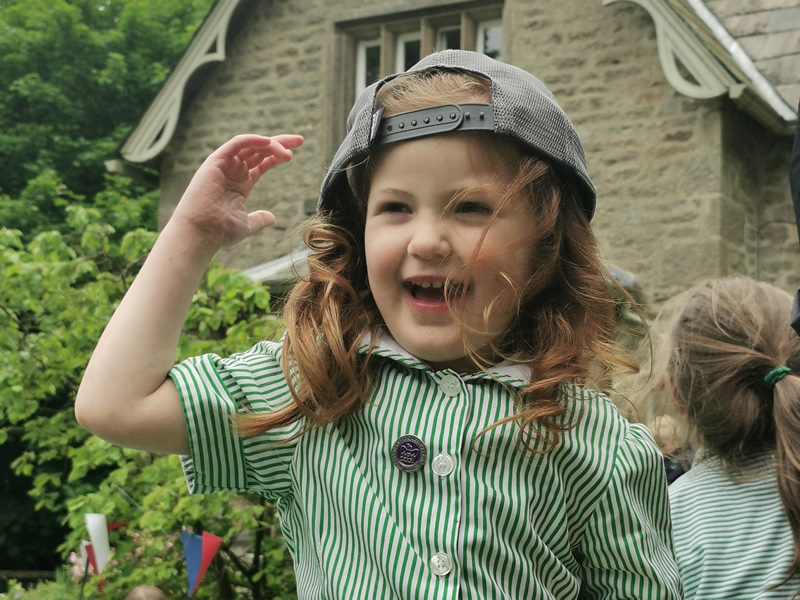 child in hat
