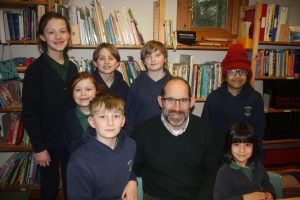 Primary children with the principal